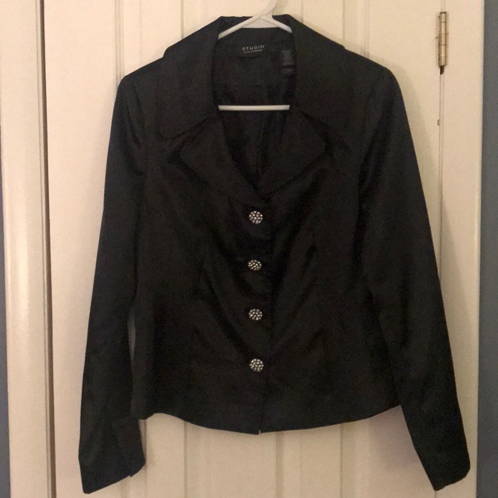 Black shiny blazer with rhinestone buttons.